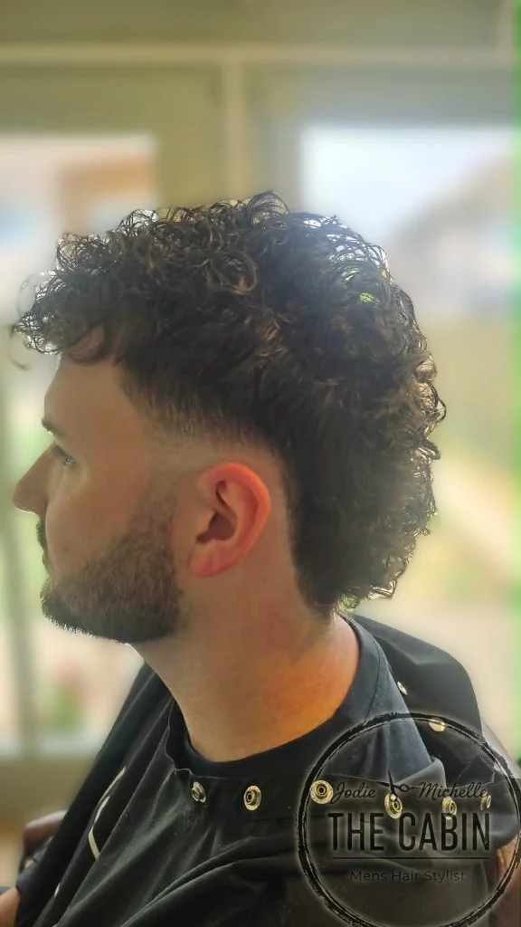 Men's permed mullet with skin fade at The Cabin